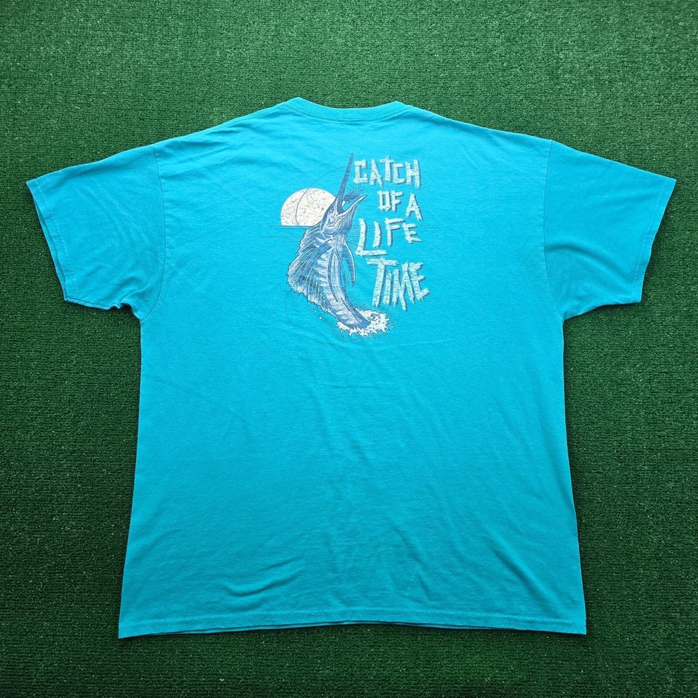 Magellan Outdoors Catch of a Life Time Tshirt Mens 2XL Green Teal Graphic Fish